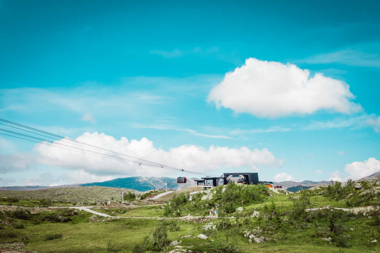 A gondola cabin on the wire outside the peak station for the Voss Gondol