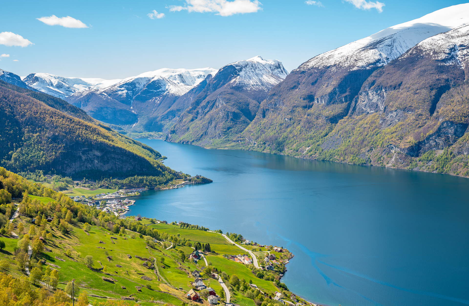 View of Aurland, Flåm, the Aurlandsfjord and surrounding mountains on a sunny spring day. 