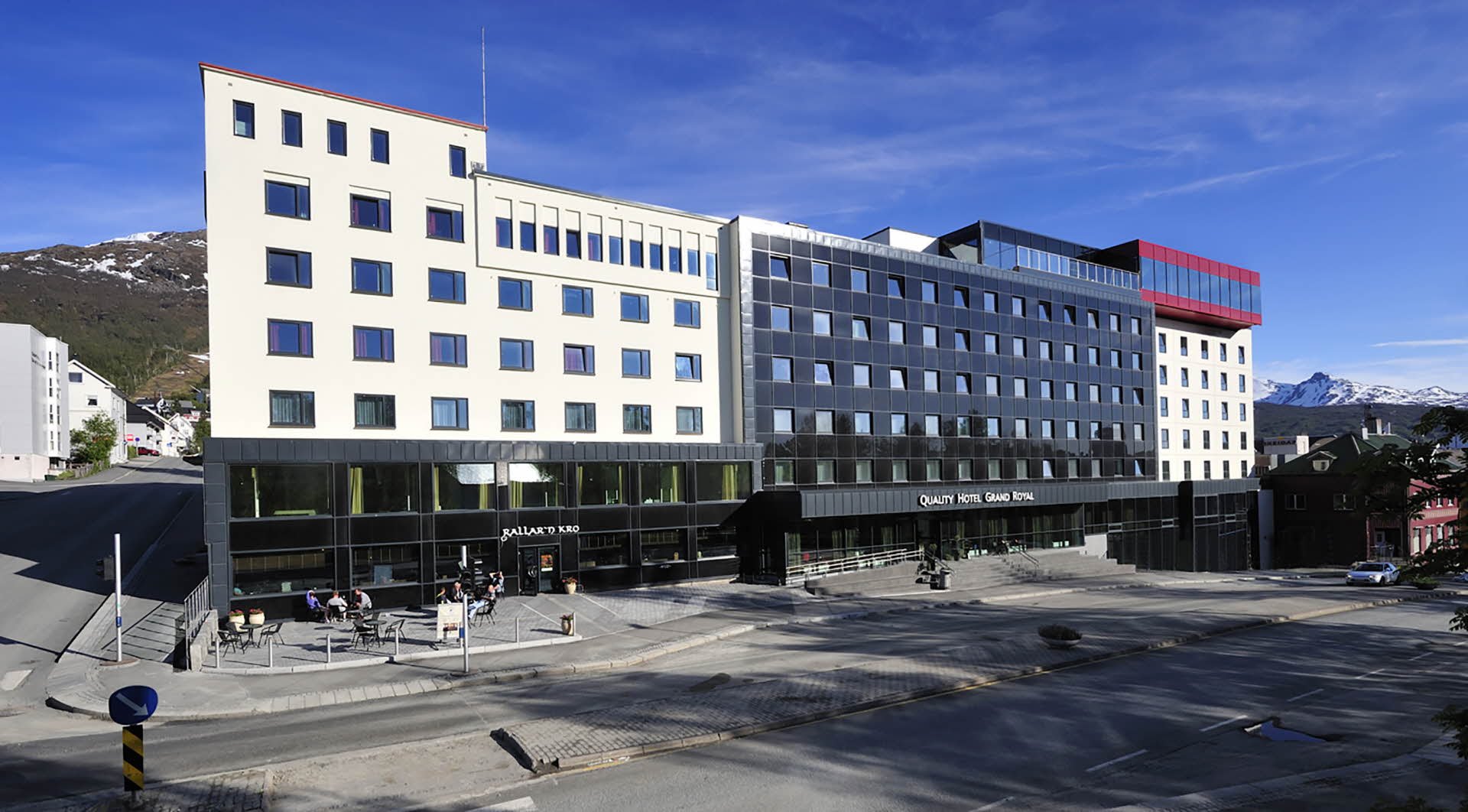 Exterior of Quality Hotel Grand Royal in Narvik on a sunny day.